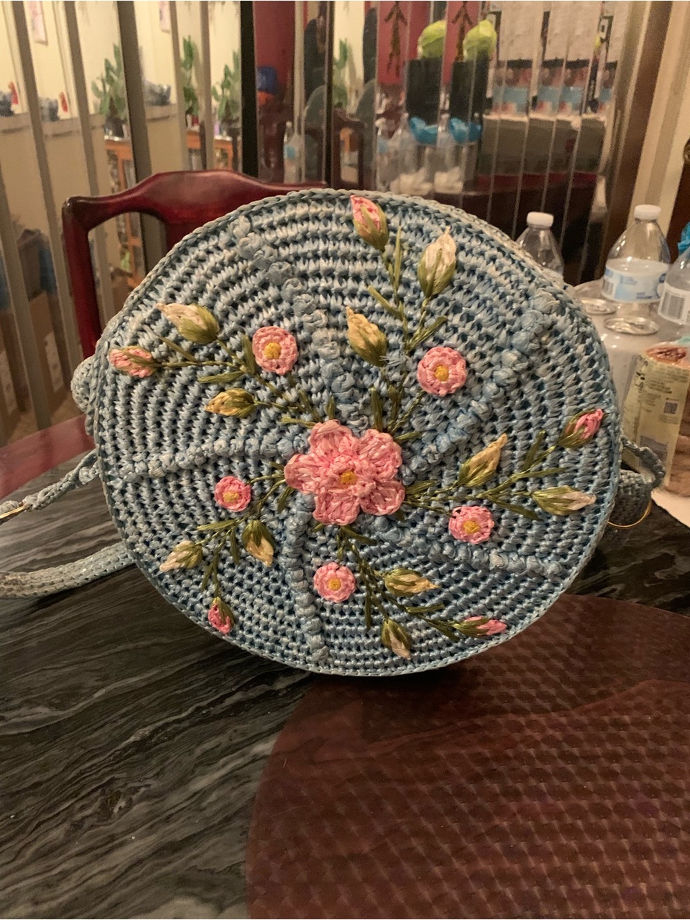 Handcrafted Blue Crochet Round Crossbody Bag with Pink Floral Embroidery